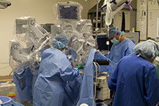 Surgical team prepares for a robot-assisted surgical procedure
