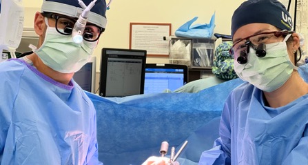 Vascular surgeons completing a surgery